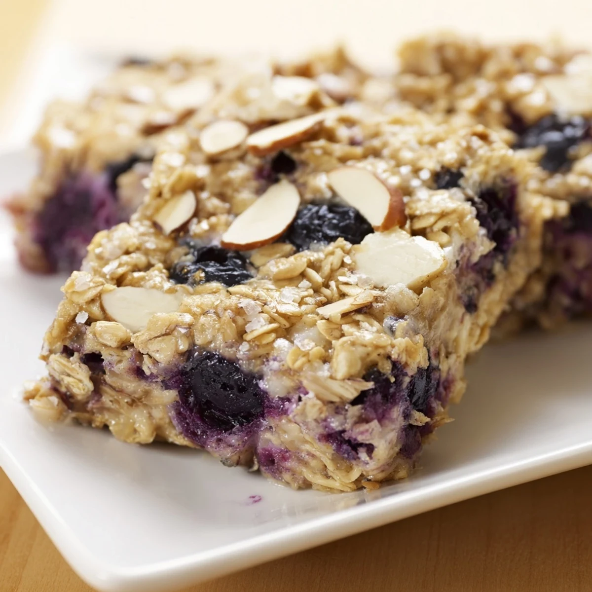 Warm blueberry cottage cheese breakfast bake served on a white plate with a fork