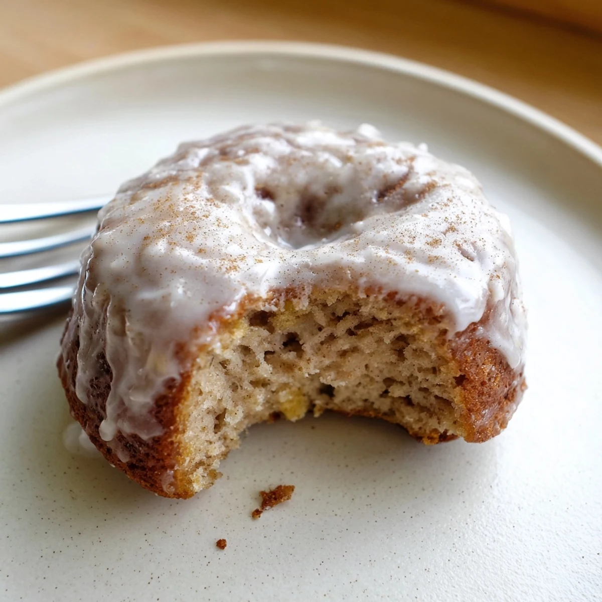 Baked Banana Donuts glazed with powdered sugar, perfect with morning coffee