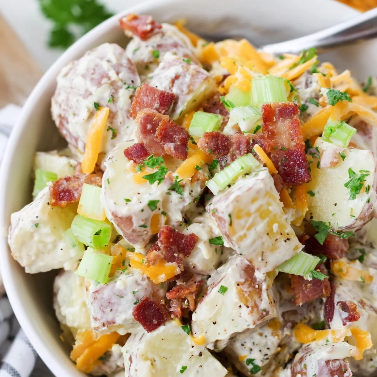 Crowd-ready Beef Bacon Loaded Potato Salad served chilled or at room temperature